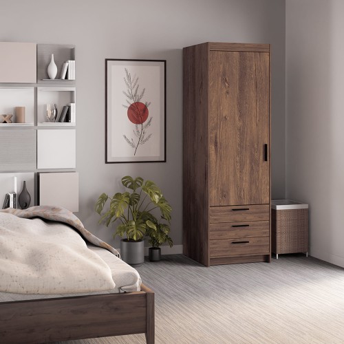 Szafa w dekorze dąb lefkas, jednodrzwiowa z trzema szufladami i czarnymi uchwytami – aranżacja sypialni.